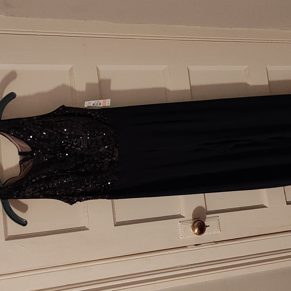 Navy Blue Jumper in size 10, brand new with original tags attached.